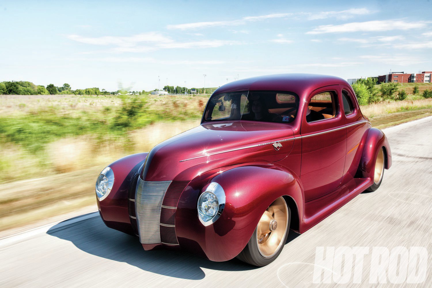 1940-ford-coupe-front-side-view-in-motio