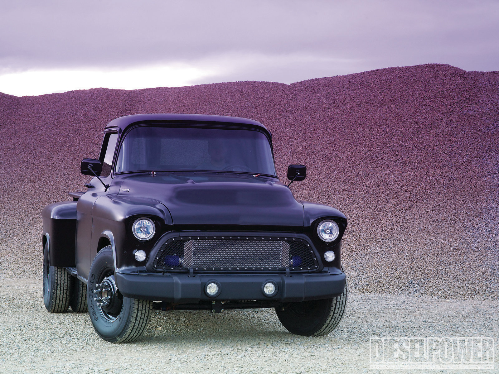 1957-chevy-pickup-in-the-black-front-thr