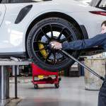 Archimedes no doubt would have gotten a kick out of Porsche’s center-lock wheels, with their stratospheric 443 lb-ft tightening torque requirement. (The GT3 RS’s 4.0-liter falls more than 100 lb-ft short of having sufficient twist to secure the car's lugs at its 6250-rpm peak.) But the Porsche technician actually made the task—which involves torquing, loosening, and then re-tightening the lugs—look easy with this extraordinarily long torque wrench.