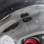 The quickest way around Virginia International Raceway—yes, we had the car at this year's Lightning Lap shootout—is to go bounding over the curbs. But that didn’t happen without some collateral damage to the GT3 RS’s rear fender wells, shown here.