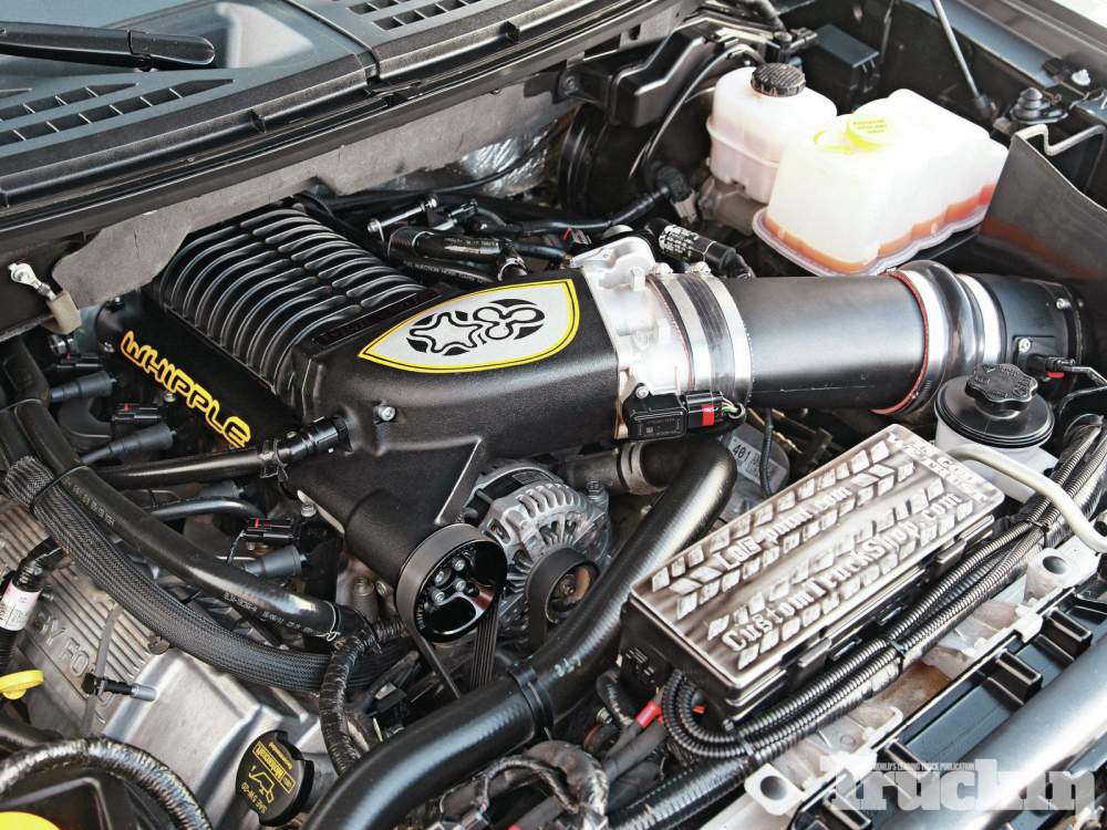 1213tr-12+2011-ford-svt-raptor+whipple-supercharger.jpg