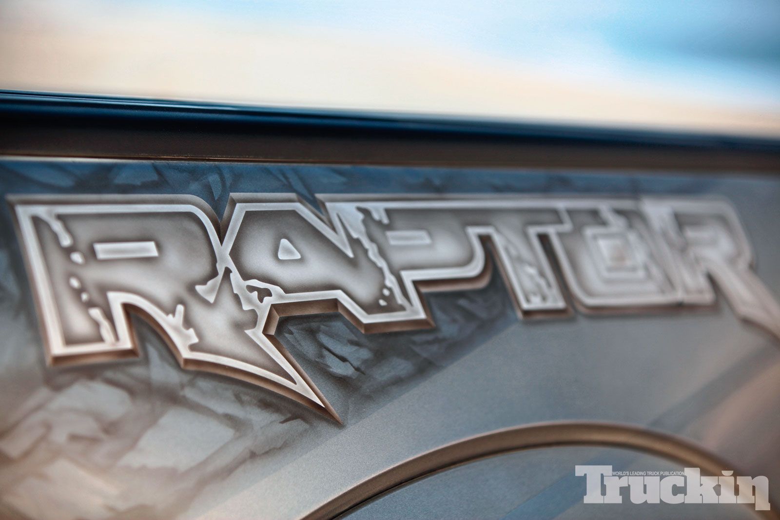 1213tr-13+2011-ford-svt-raptor+airbrushed-raptor-name.jpg