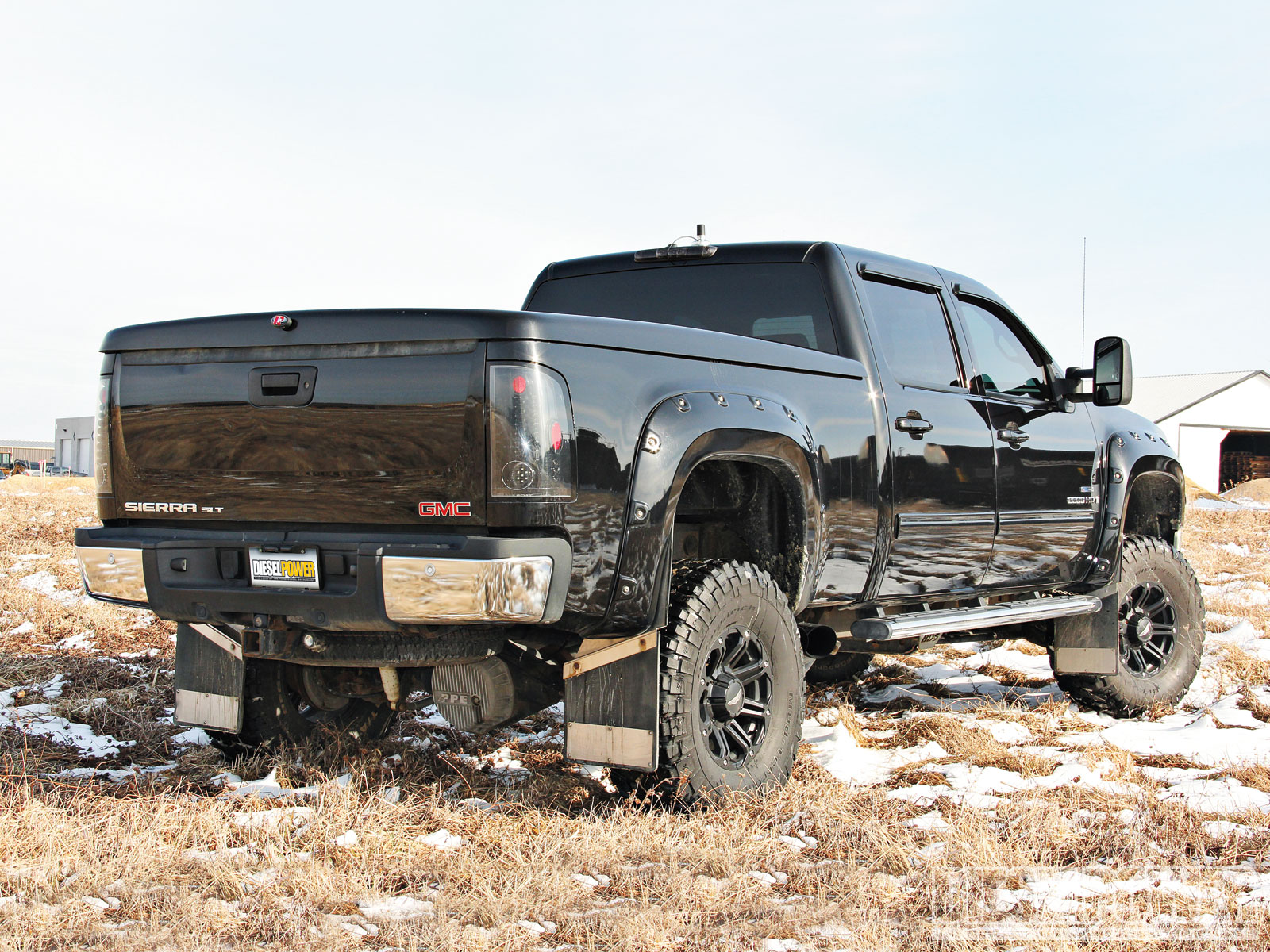 1208dp_07+fit_for_a_foreman+2008_gmc_sierra_2500_rear_three_quarter.jpg