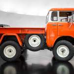 Now that you’ve had a moment to wrap your head around the genius of the FC150 concept, we’ll share a few more details. Mating the FC body to the modern underpinnings was a fairly straightforward affair, although it did require the TJ chassis to be shortened and some custom fitting of the body mounts. Although it wears a near perfect patina as it sits, the donor vehicle did require some body repair, including the repainting of some sections of the bodywork, which were later weathered to match. The engine position miraculously turned out to be just about perfect, and it sits in the frame just as it left the factory. A Dana 44 axle underpins the front, and a Dana 60 rides out back. 33-inch BFGoodrich Mud-Terrain T/A KM2 tires are mounted to period correct 17-inch white steelies. Inside, the FC150 features vinyl seat covers, a custom headliner wrapped in a vintage duck-hunting pattern, an analog compass, Mopar all-weather mats, and, arguably our favorite interior bit, an old CB radio. A 1960 Michigan “farm” license plate and vintage auxiliary lamp complete the look. READ MORE ››