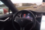 Tesla Model S owner tests Autopilot system from back seat