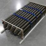 Besides the cost of the fuel-cell stack and the lack of a refueling infrastructure, the other major issue with this alternative to the battery-powered car is storing the hydrogen. Until now, fuel-cell-powered vehicles have stored hydrogen gas in bulky carbon-fiber-wrapped cylinders at pressures up to 10,000 psi. For several years the U.S. Department of Energy’s Advanced Research Projects Agency–Energy (ARPA-E) has been funding a variety of research projects to develop conformable storage systems for compressed natural gas. One in particular could be adapted to hydrogen storage. The “intestinal” storage system developed by San Francisco startup Volute consists of a series of what are essentially small gas cylinders linked together in series and wrapped back and forth on top of one another. An arrangement like this provides much greater packaging flexibility than one or two large cylinders, making it practical in smaller cars and in irregularly shaped areas.