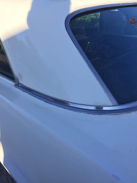 rear window lower trim.JPG