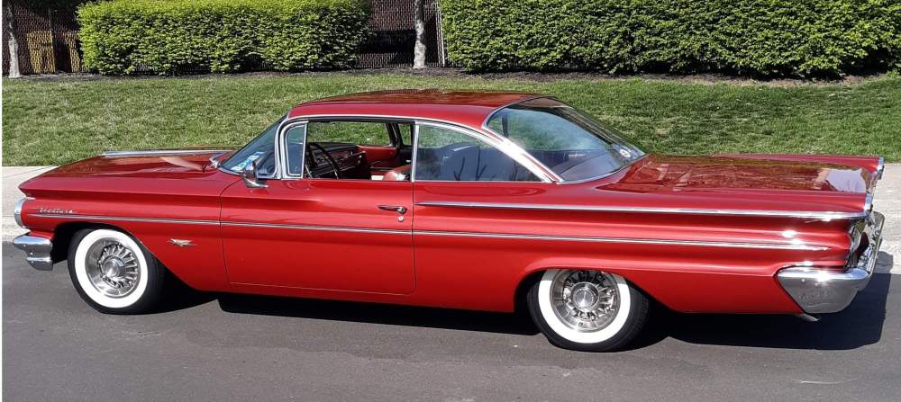 1960 Pontiac Ventura in front of Joe Cannon Stadium 2025 cropped jpeg close up.jpg